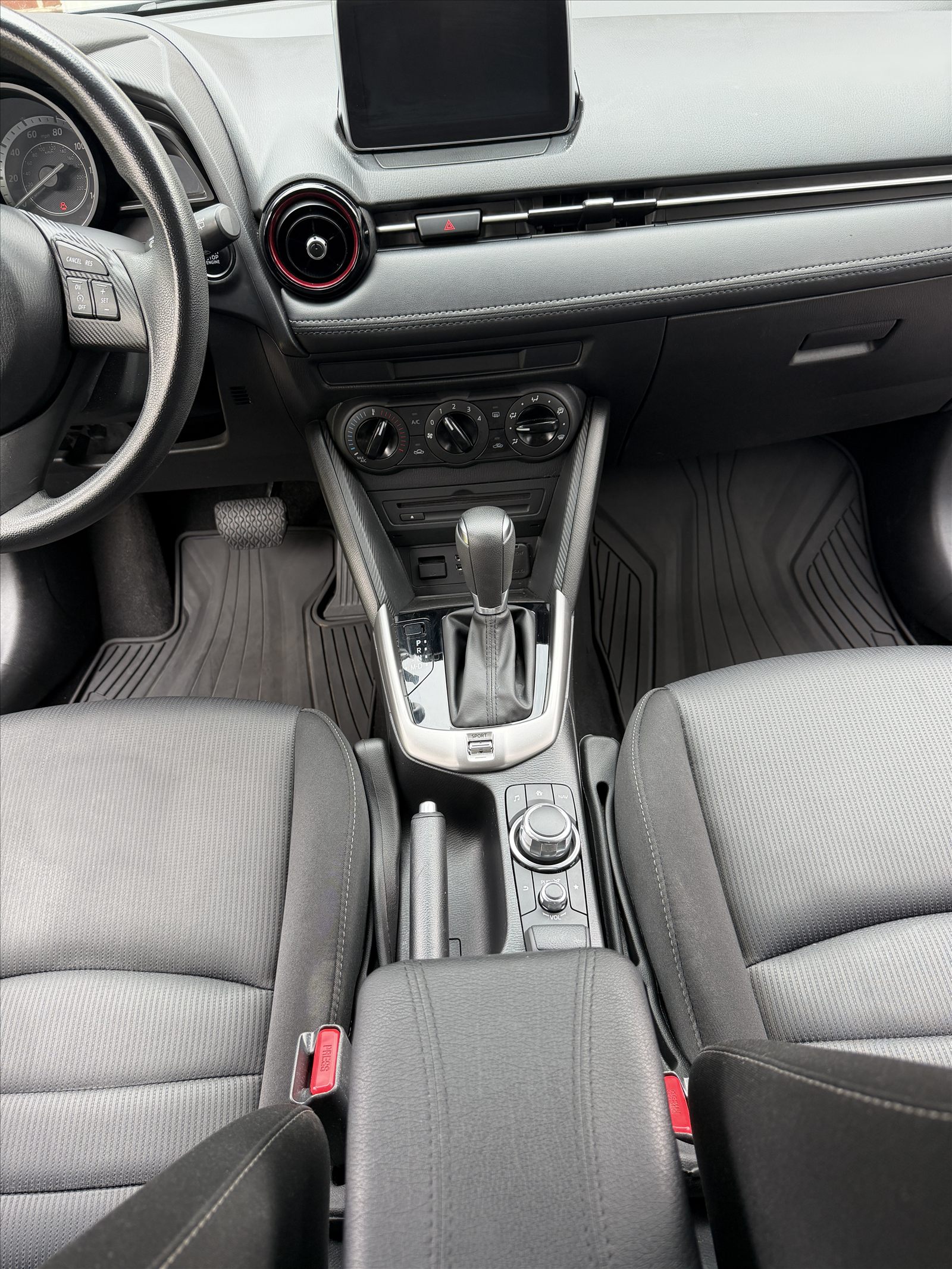 Clean Mazda CX-3 front interior and center console after detailing