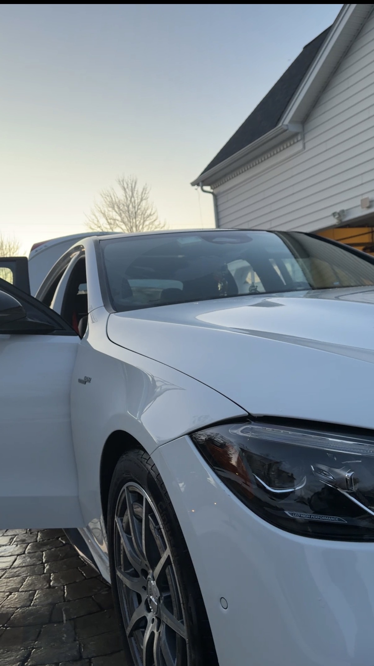 Clean white Mercedes exterior after detailing